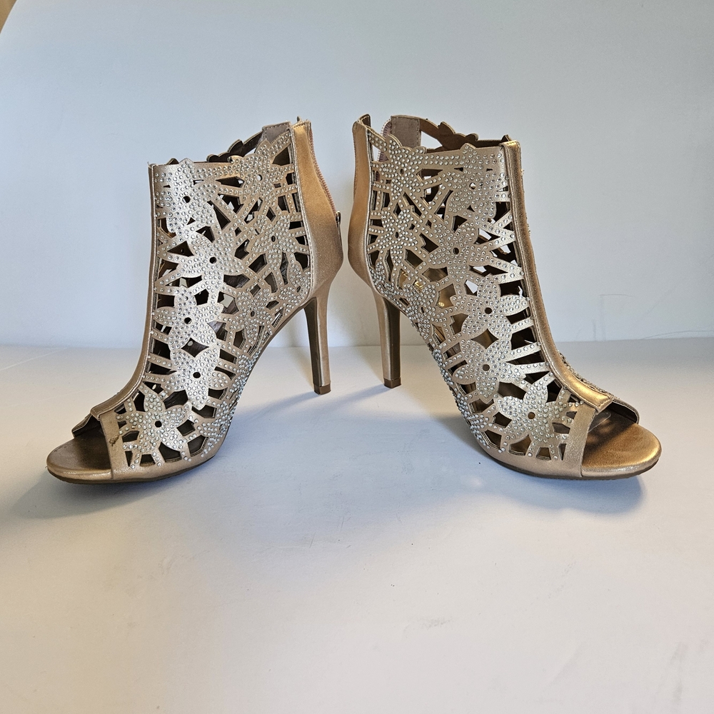 Madeline Stuart Gold Stiletto Heels with Intricate Cutout Design